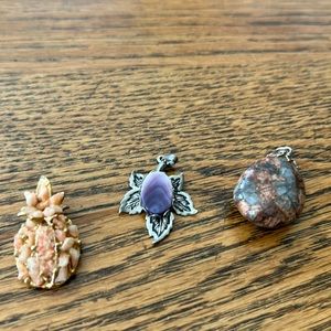 Bundle of three stone pendants